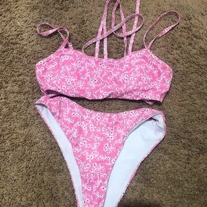 A pink wrap bathing suit